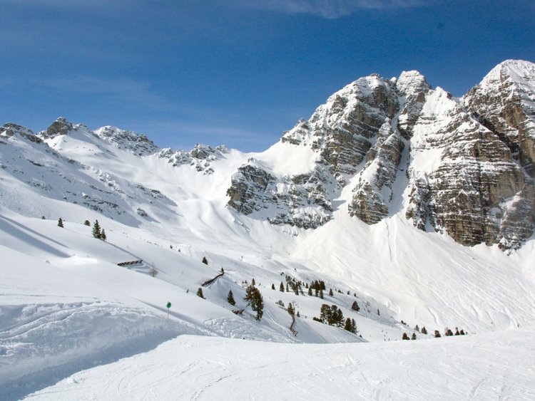 Discover the Jagdhof, Stubaital, and Tyrol Snow-covered mountains under a clear blue sky